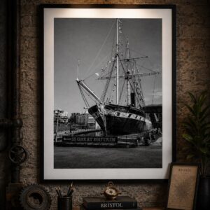 Framed black and white SS Great Britain Bristol wall art print displayed in a contemporary interior setting